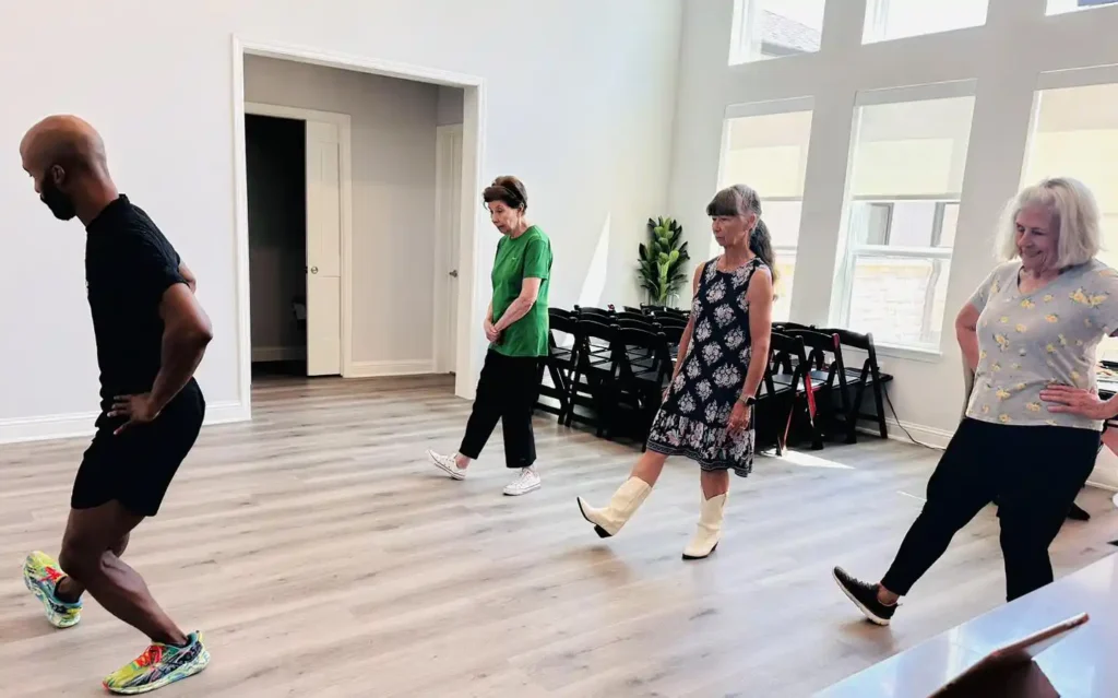 Cottages residents enjoying a dance lesson