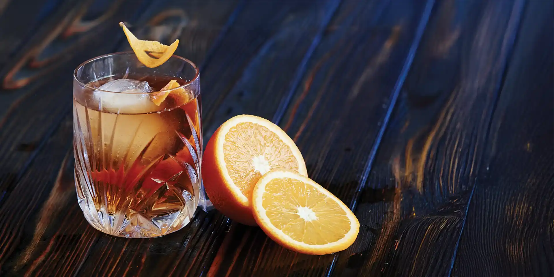 Photo of a cocktail with orange slice