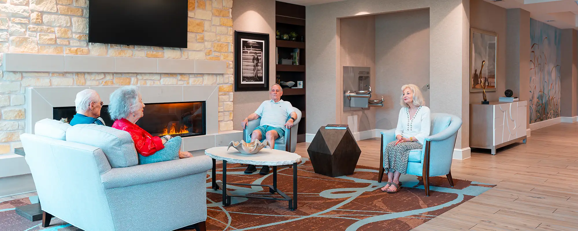 Residents having a conversation in the lobby