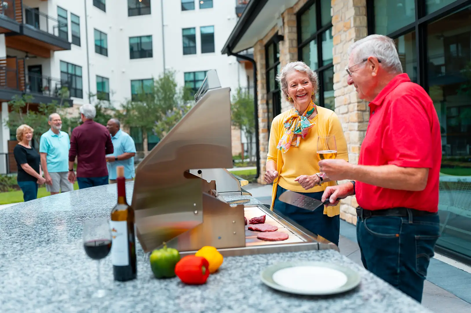 Residents enjoying the grilling area